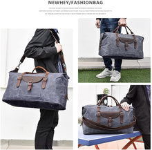 Load image into Gallery viewer, Waterproof Canvas Travel Duffel Bag
